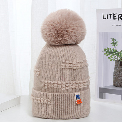 Γυναικείο πλεκτό καπέλο με φούντα