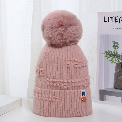 Γυναικείο πλεκτό καπέλο με φούντα