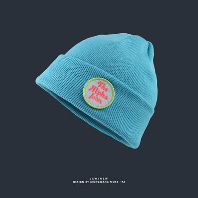 Vékony kötött sapka színes hímzéssel - sok színben