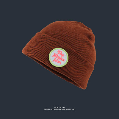 Vékony kötött sapka színes hímzéssel - sok színben