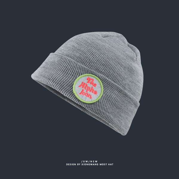 Vékony kötött sapka színes hímzéssel - sok színben