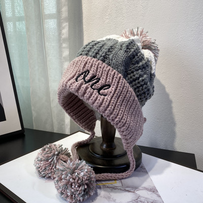 Πλεκτό γυναικείο καπέλο με κορδόνια και κεντήματα