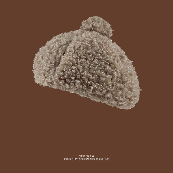 Molyhos téli sapka pomponnal