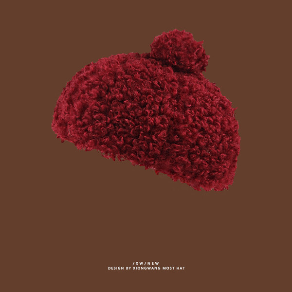 Molyhos téli sapka pomponnal