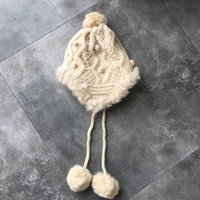 Νέο πλεκτό γυναικείο καπέλο με ωτοασπίδες τύπου φούντες