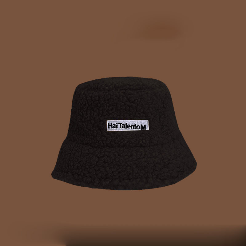 Moteriškos pliušinės kepurės tipo idiotas