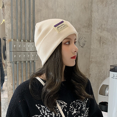 Női kötött téli sapka