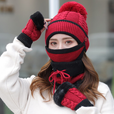 Női téli sapka tollal