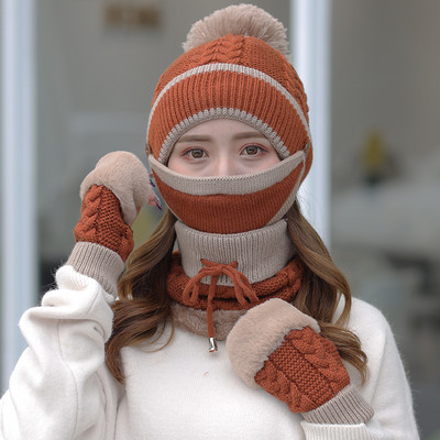 Női téli sapka tollal