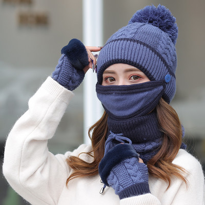 Női téli sapka tollal