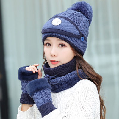 Női téli sapka tollal