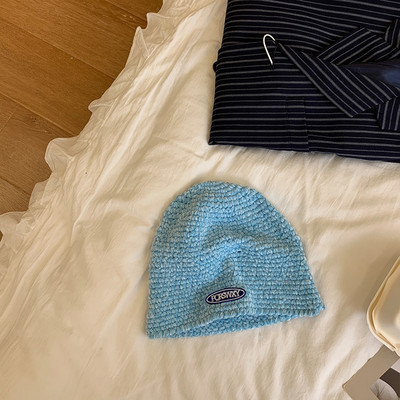 Γυναικείο καπέλο με έμβλημα