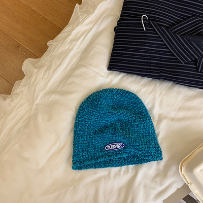 Γυναικείο καπέλο με έμβλημα