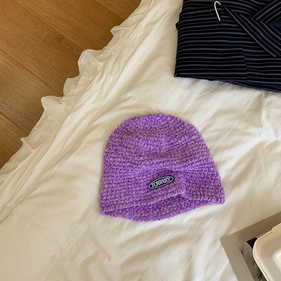 Γυναικείο καπέλο με έμβλημα