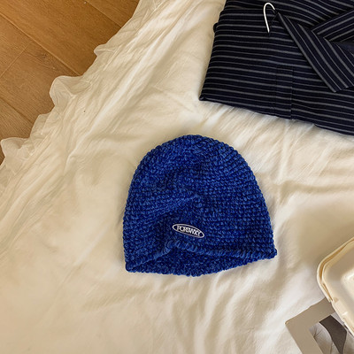 Γυναικείο καπέλο με έμβλημα