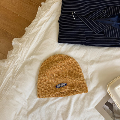 Γυναικείο καπέλο με έμβλημα