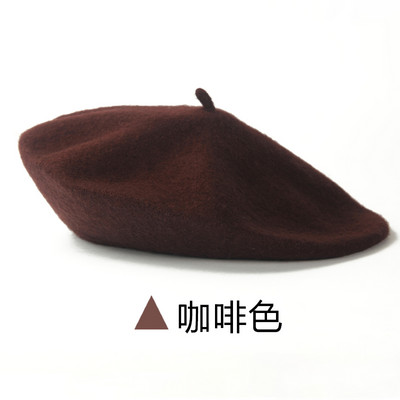 Jesensko-zimska vunena ženska kapa tipa beretka