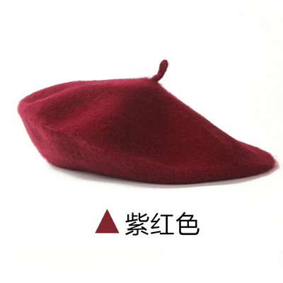 Jesensko-zimska vunena ženska kapa tipa beretka