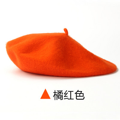 Jesensko-zimska vunena ženska kapa tipa beretka