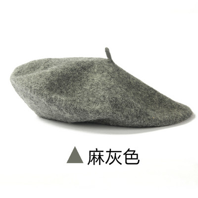 Jesensko-zimska vunena ženska kapa tipa beretka