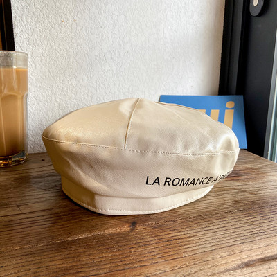 Új modell női sapka műbőrből, felirattal