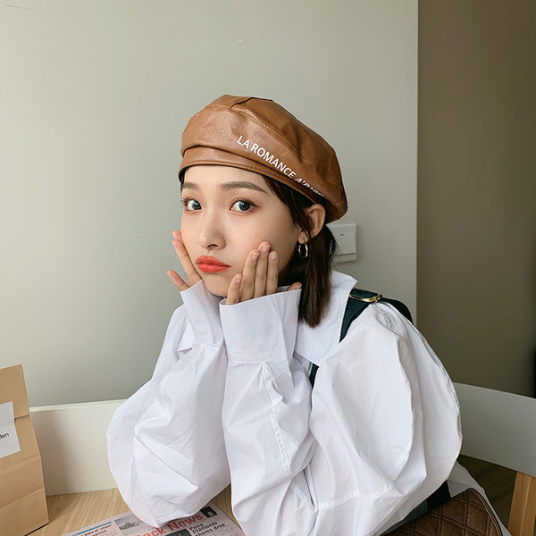 Új modell női sapka műbőrből, felirattal