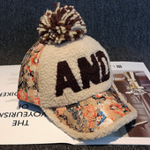 Modern női sapka virágmintával és napellenzővel