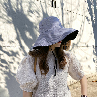 Női napvédő sapka rojtokkal