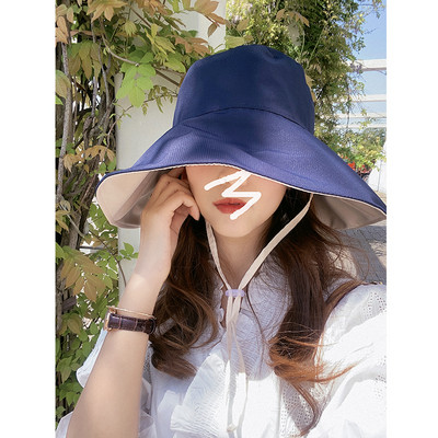 Női napvédő sapka rojtokkal