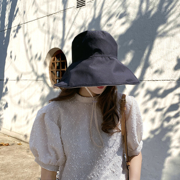 Női napvédő sapka rojtokkal