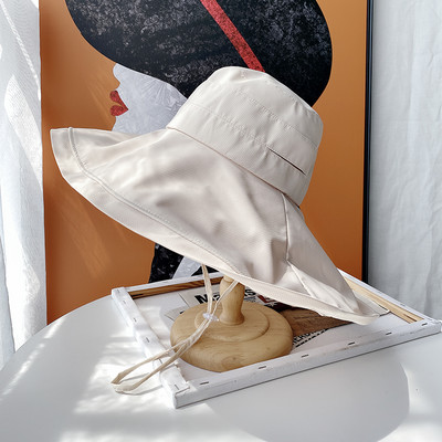 Γυναικείο καπέλο με κρόσσια και κορδόνια