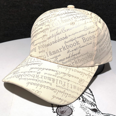 Ženska ležerna kapa sa šilterom i natpisima