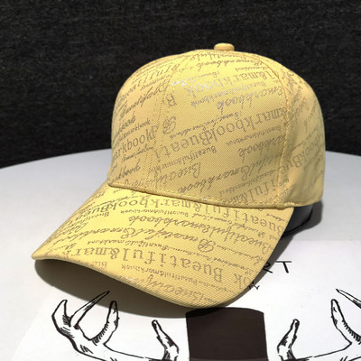 Ženska ležerna kapa sa šilterom i natpisima