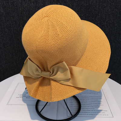 Moderan ženski šešir s trakom pogodan za ljeto