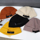 Pletena ženska zimska kapa