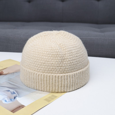 Pletena ženska zimska kapa