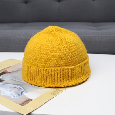 Pletena ženska zimska kapa