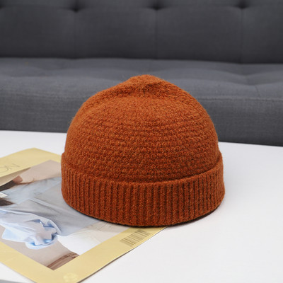 Pletena ženska zimska kapa