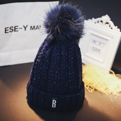 Πλεκτό χειμερινό καπέλο με φούντα