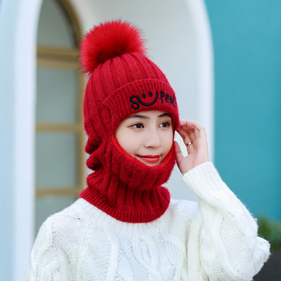 Ženska zimska pletena kapa s paperjem - nekoliko modela