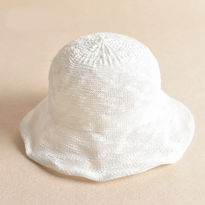 Alkalmi női sapka rojtokkal