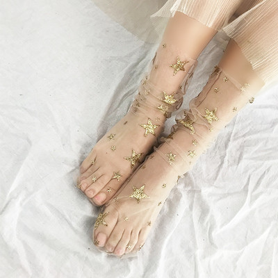 Átlátszó hálós zokni fényes díszítéssel