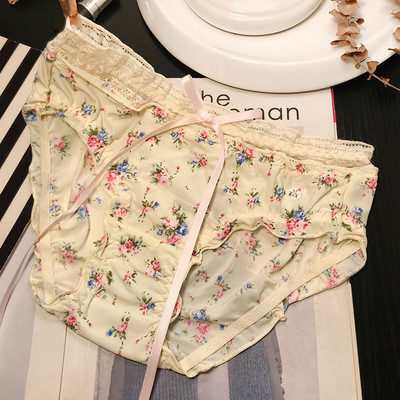 Színes női bikini szalaggal és virágmintával