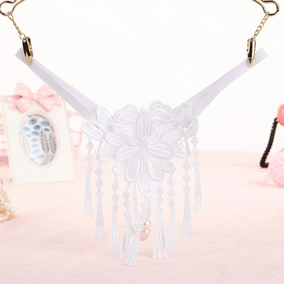 Női tanga rojtokkal és hímzéssel