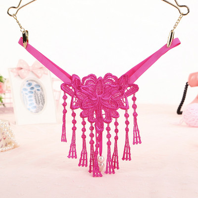 Női tanga rojtokkal és hímzéssel