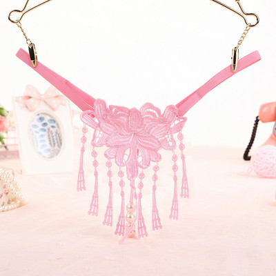 Női tanga rojtokkal és hímzéssel