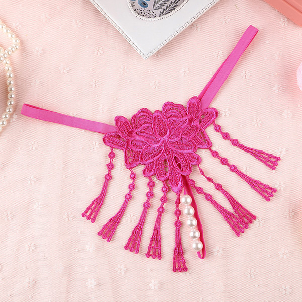 Női tanga rojtokkal és hímzéssel