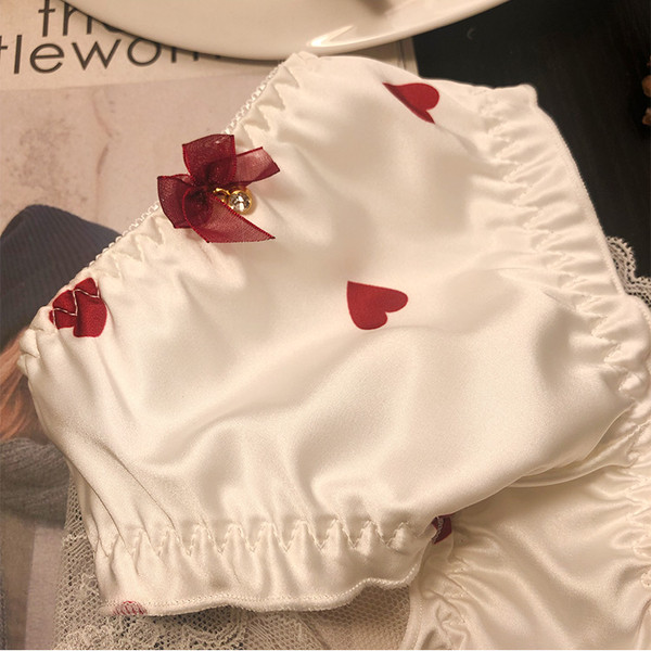 Női bikini szívekkel, csipkével