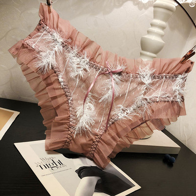 Női bikini tüllel és tollal