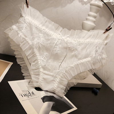 Női bikini tüllel és tollal